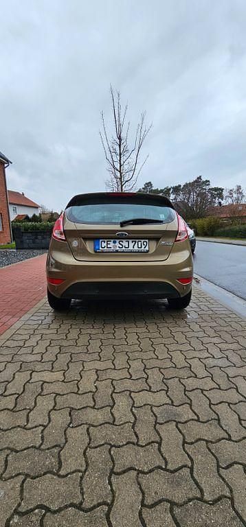 Gebraucht Ford Fiesta 82 PS (60 kW) 2013 Gold Kleinwagen