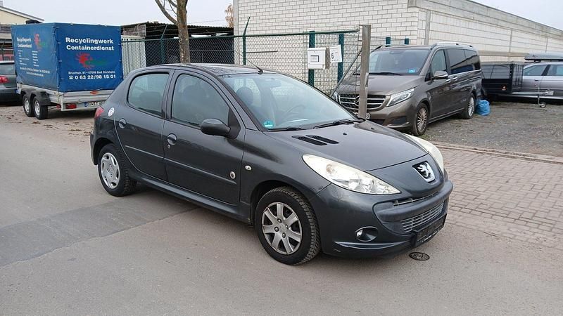 Grau Gebraucht 2012 Peugeot 206+ Kleinwagen | 2.300 € (Fairer Preis) - Bild 1/4