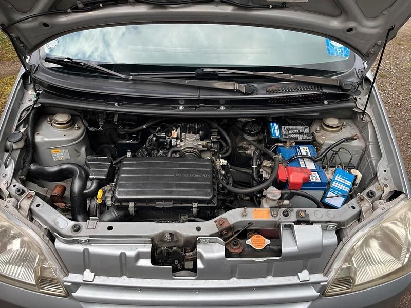 Gebraucht Daihatsu Cuore 58 PS (42 kW) 2006 Silber Kleinwagen