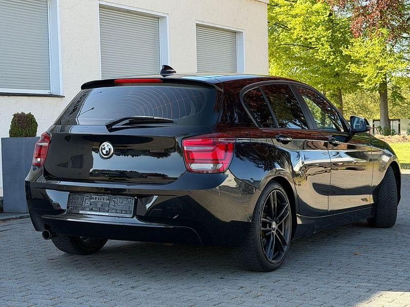 Second-hand BMW 118 Comfort Edition 143 CP (105 kW) 2014 Negru Hatchback
