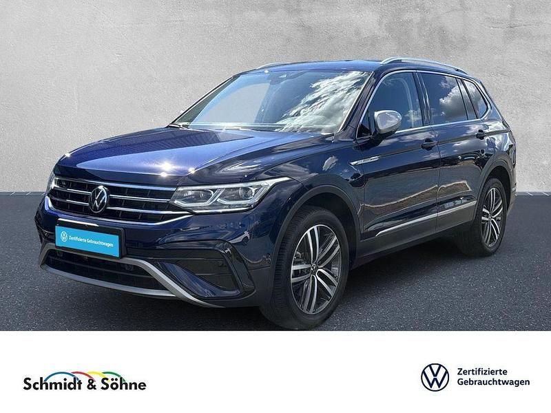 Blau metallic Gebraucht 2023 VW Tiguan Allspace Elegance SUV | 41.398 € (Fairer Preis) - Bild 1/4