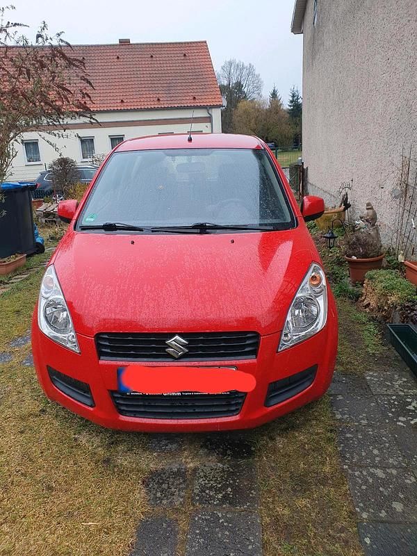 Usado Suzuki Splash 68 CV (50 kW) 2012 Rojo Utilitario