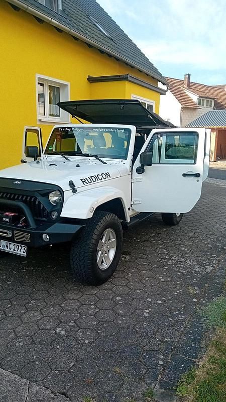 Weiß Gebraucht 2011 Jeep Wrangler Sahara SUV | 23.500 € (Guter Preis) - Bild 1/4