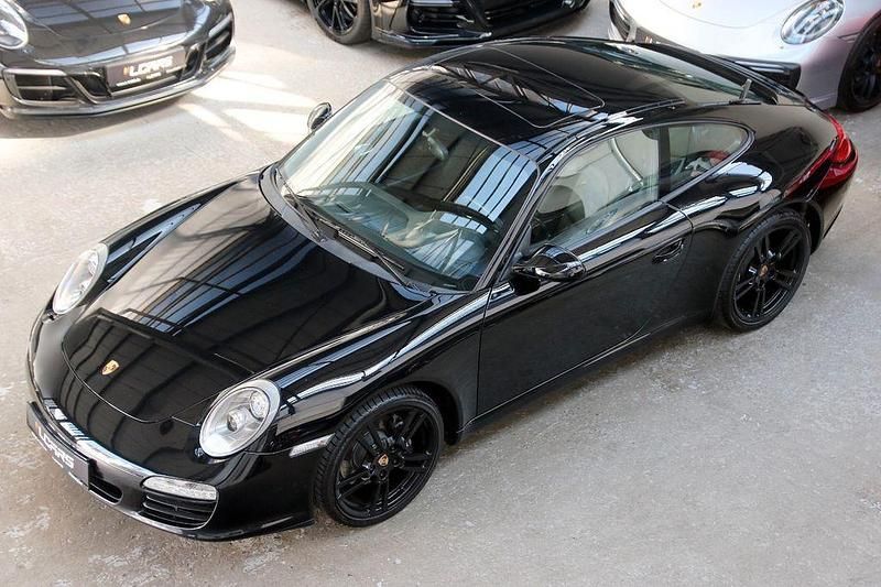 Schwarz Gebraucht 2009 Porsche 911 Carrera Coupé | 55.990 € (Superpreis) - Bild 1/4