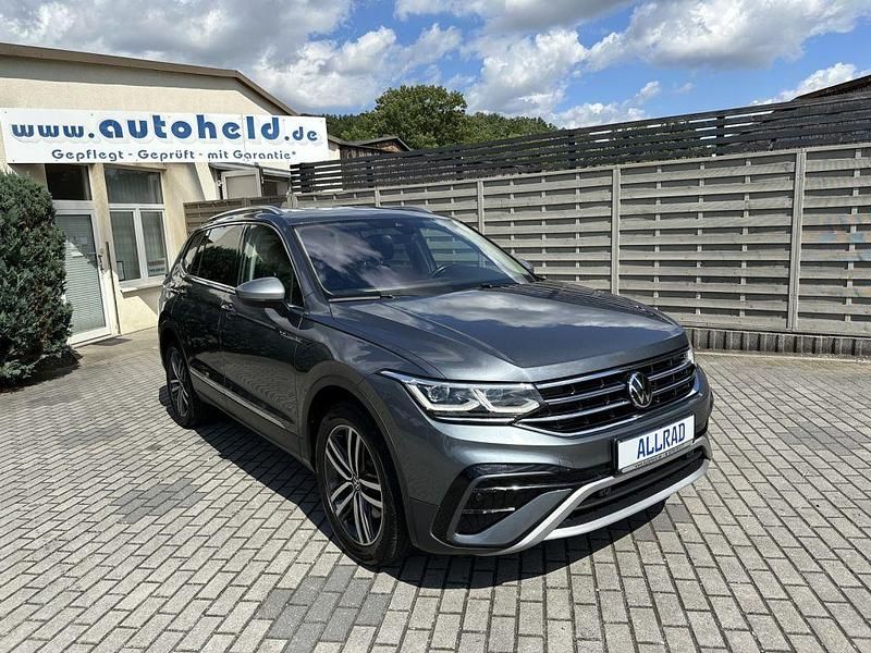 Platinum grey metallic (metallic) Gebraucht 2022 VW Tiguan Allspace SUV | 21.994 € (Superpreis) - Bild 1/4