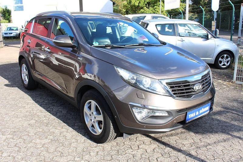 Braun Gebraucht 2013 Kia Sportage Spirit SUV | 10.900 € (Fairer Preis) - Bild 1/4