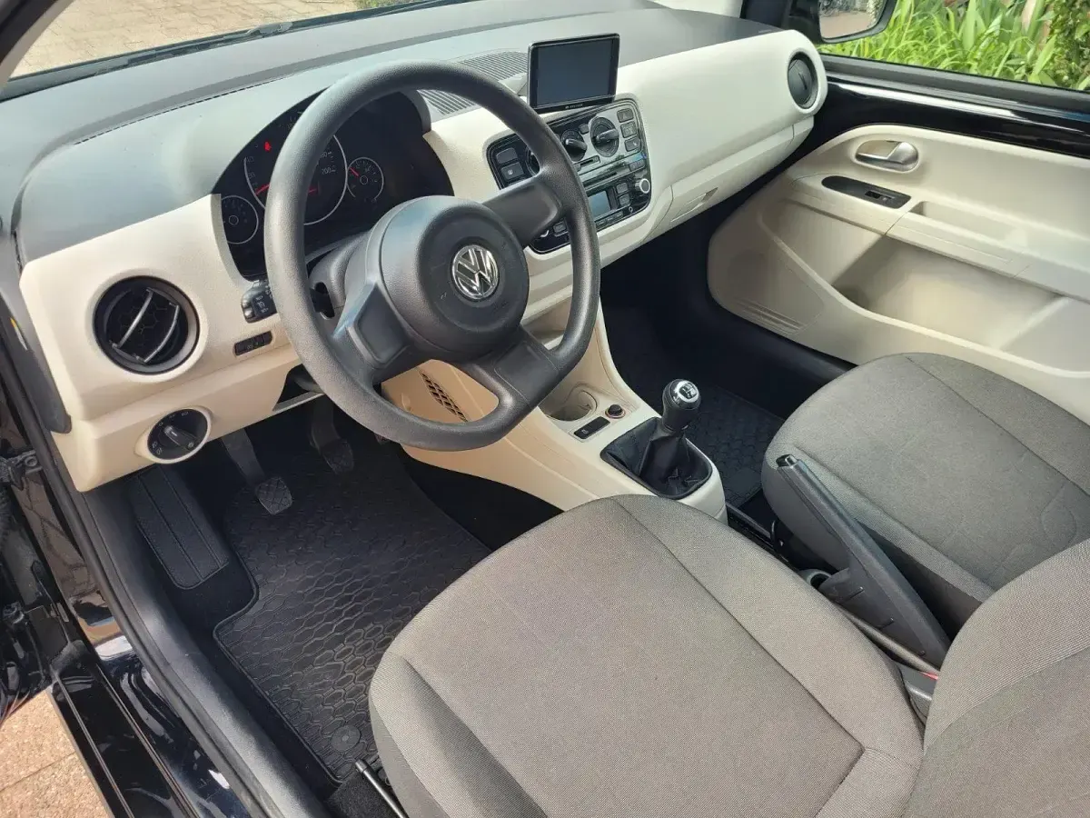 Usado VW up! 75 CV (55 kW) 2012 Negro Utilitario