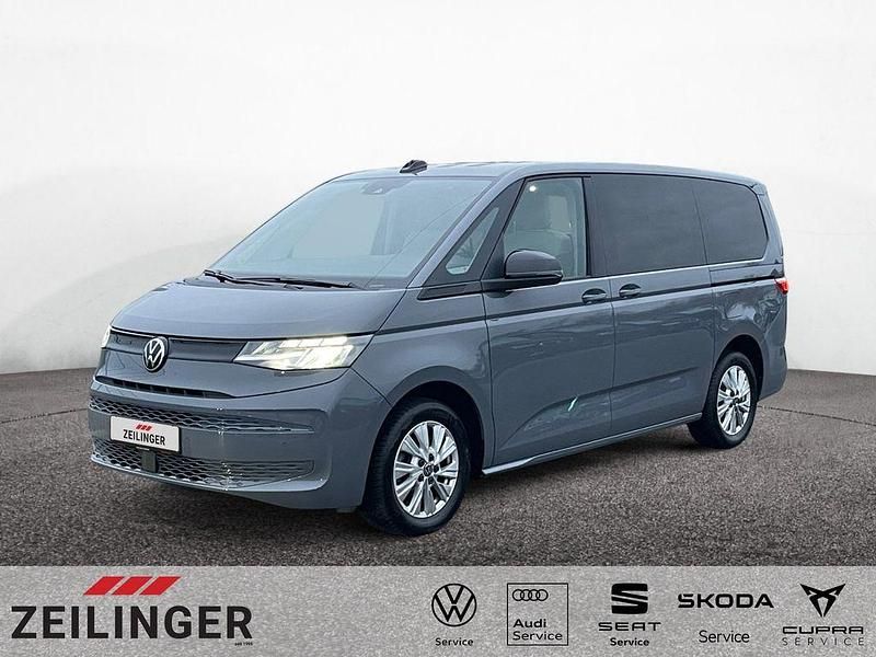 Grau Gebraucht 2023 VW Multivan Van | 44.244 € (Superpreis) - Bild 1/4