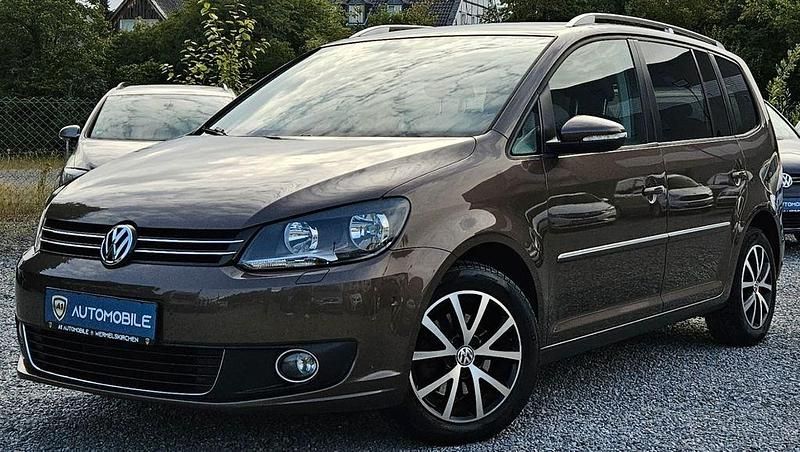 Braun Gebraucht 2011 VW Touran Highline Van / Kleinbus | 11.999 € (Teuer) - Bild 1/4