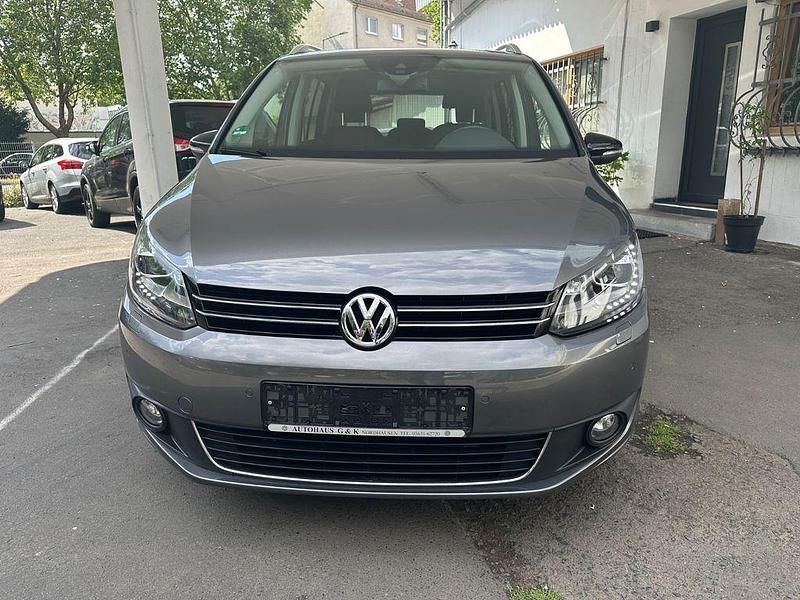 Grau Gebraucht 2012 VW Touran Style Van / Kleinbus | 10.490 € (Etwas zu teuer) - Bild 1/4