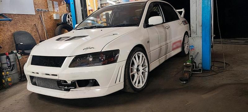 Second-hand Mitsubishi Lancer Evolution 280 CP (205 kW) 2001 Alb Berlinǎ