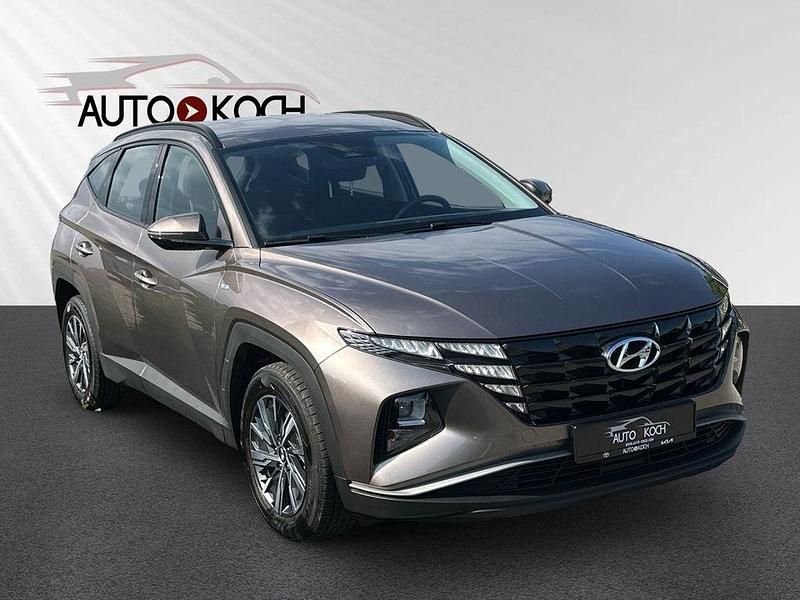 Braun Gebraucht 2023 Hyundai Tucson Select SUV | 27.590 € (Guter Preis) - Bild 1/4
