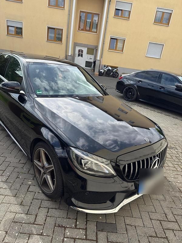 Schwarz Gebraucht 2017 Mercedes C250 AMG line Limousine | 16.455 € (Superpreis) - Bild 1/4