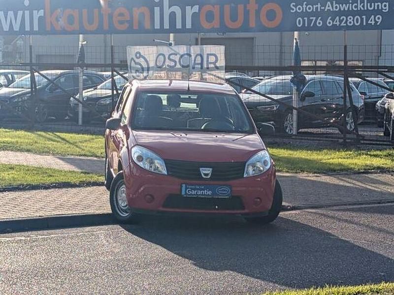 Rot passion (metallic) Gebraucht 2009 Dacia Sandero Basis Limousine | 1.699 € (Guter Preis) - Bild 1/4