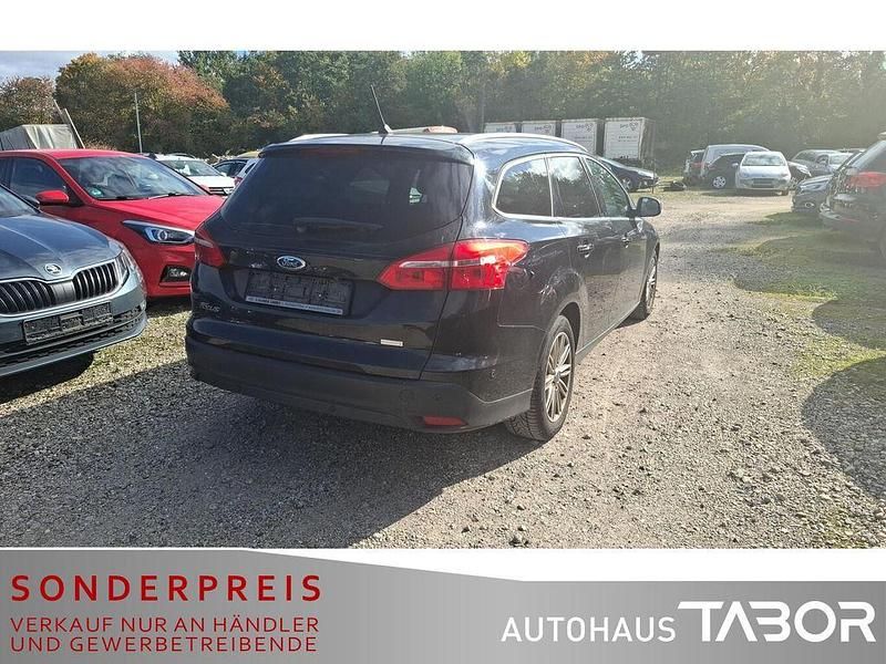 Gebraucht Ford Focus Titanium 125 PS (91 kW) 2017 Iridiumschwarz metallic Kombi