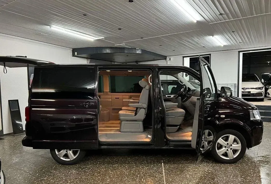 Używany VW T5 179 KM (131 kW) 2013 Purpurowy Van