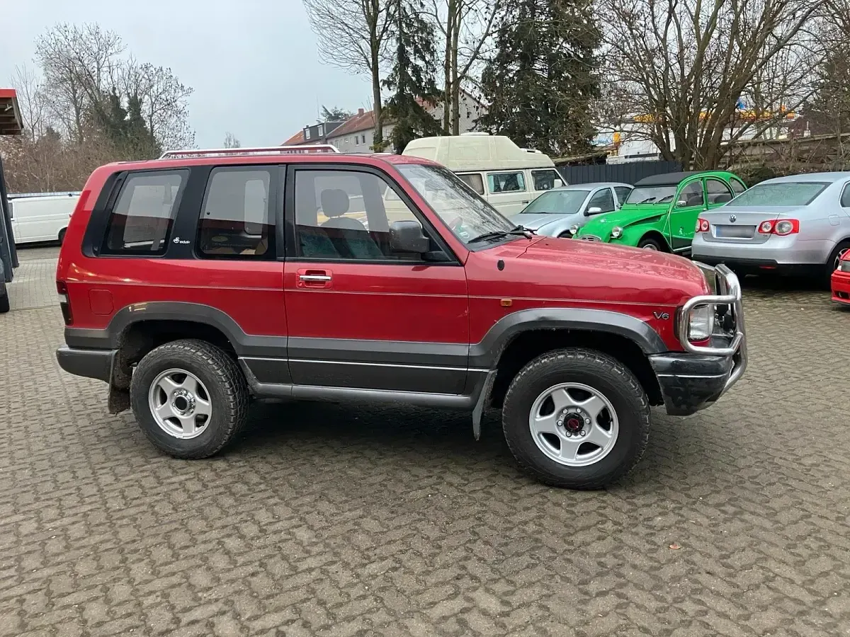 Używany Opel Monterey 176 KM (129 kW) 1992 Czerwony SUV