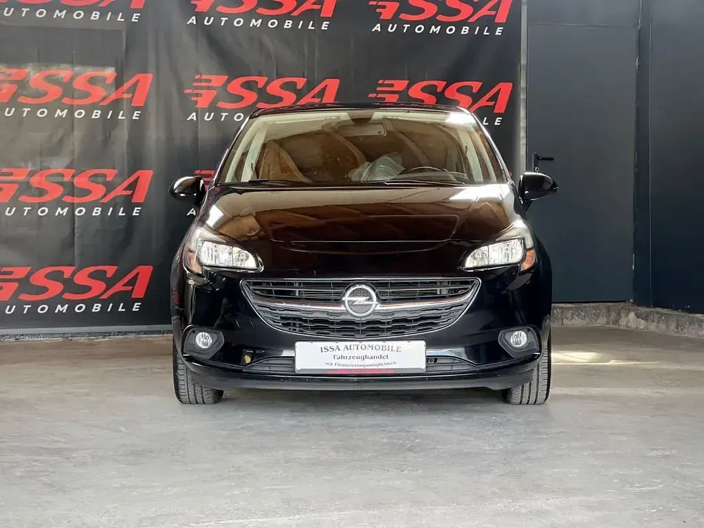 Używany Opel Corsa drive 90 KM (66 kW) 2016 Czarny Hatchback