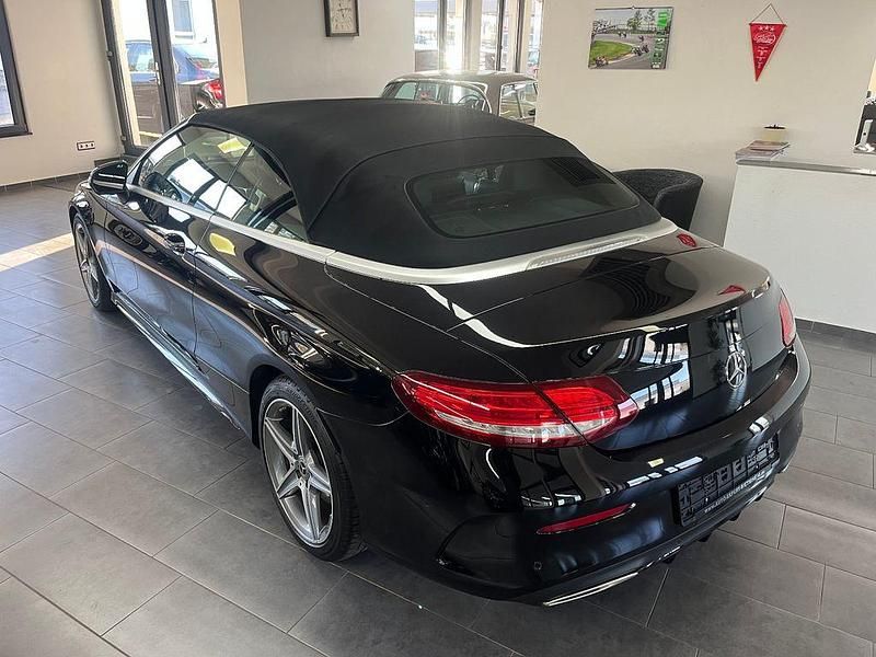 Gebraucht Mercedes C180 AMG line 156 PS (114 kW) 2017 Obsidianschwarz Cabrio