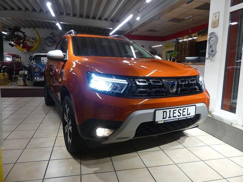 Orange Gebraucht 2022 Dacia Duster Prestige SUV | 19.990 € (Etwas zu teuer) - Bild 1/4
