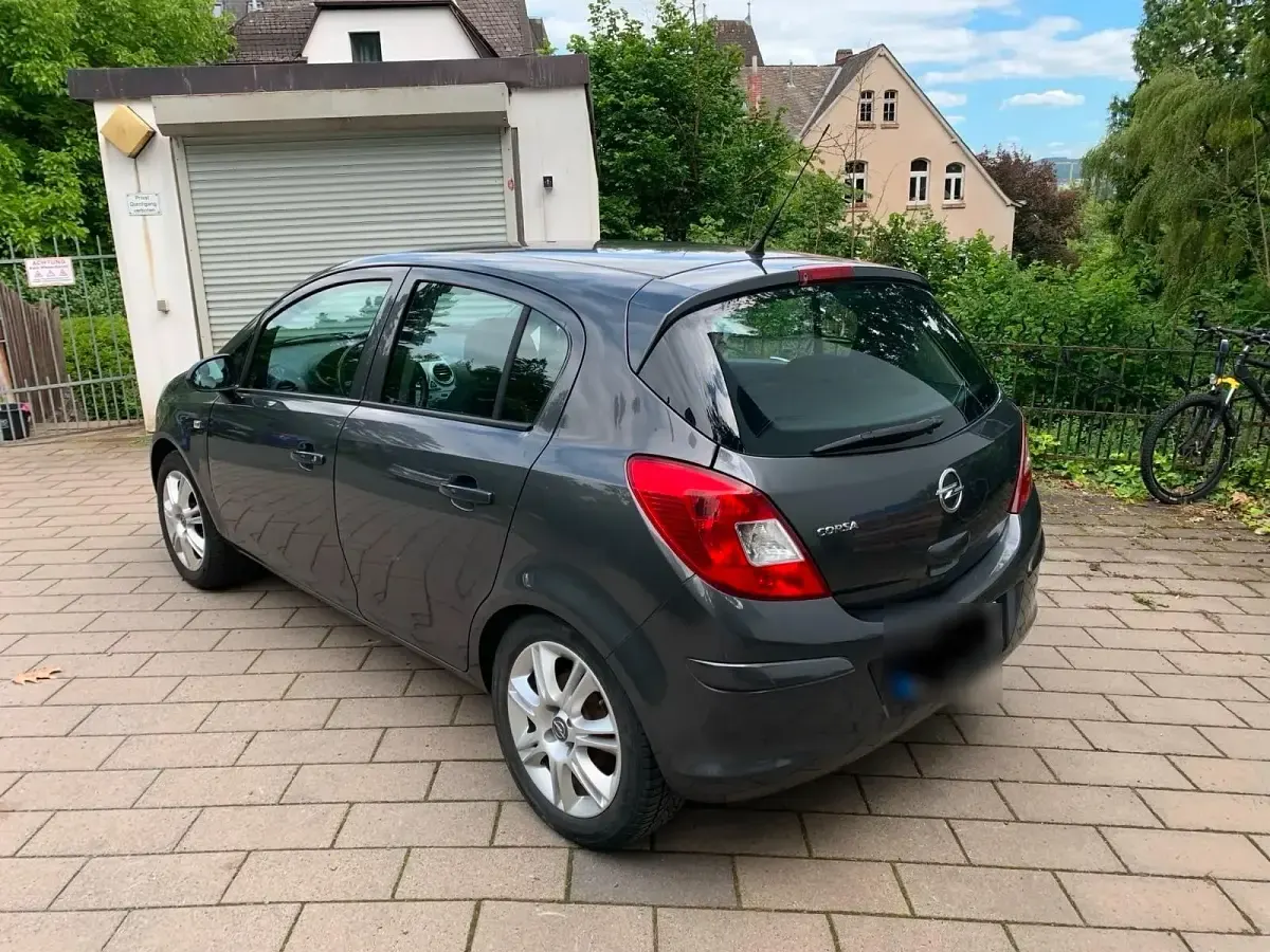 Gebraucht Opel Corsa 86 PS (63 kW) 2011 Grau Kleinwagen
