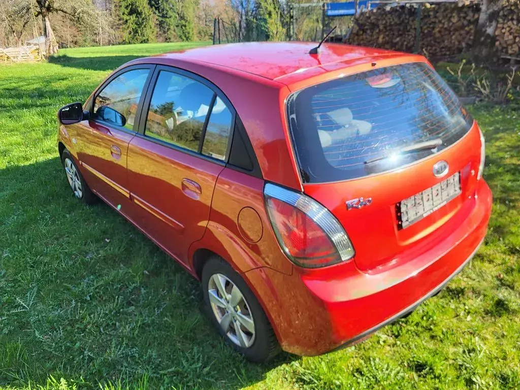 Gebraucht Kia Rio 97 PS (71 kW) 2011 Rot Limousine