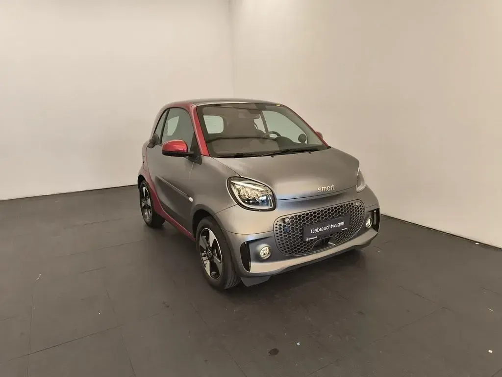 Gebraucht Smart ForTwo Electric Drive Exclusive 60 kW (82 PS) 2024 Bodypanels in titania grey (matt) Coupé