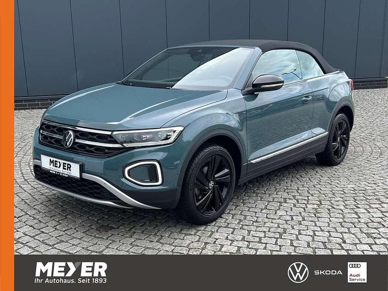 Blau Gebraucht 2024 VW T-Roc Cabriolet Style Cabrio | 33.890 € (Fairer Preis) - Bild 1/4