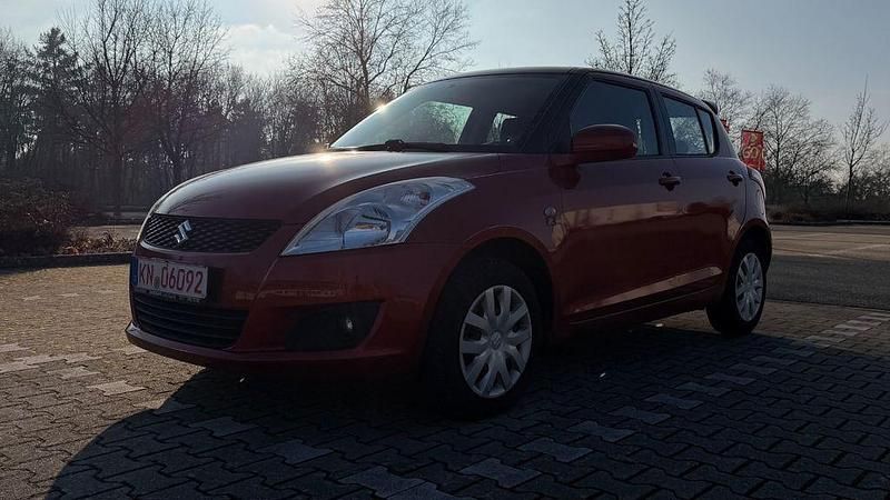 Gebraucht Suzuki Swift Club 94 PS (69 kW) 2011 Orange Kleinwagen