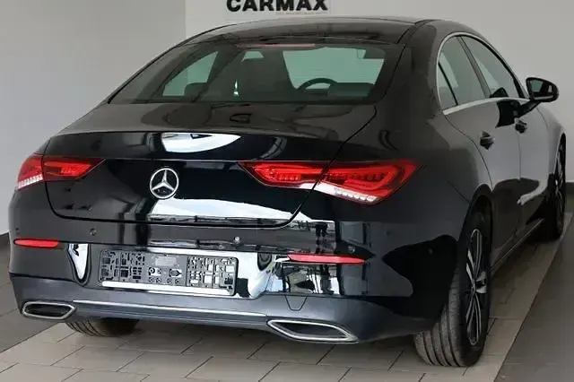 Gebraucht Mercedes CLA200 212 PS (155 kW) 2021 Kosmosschwarz  metalliclack (metallic) Coupé