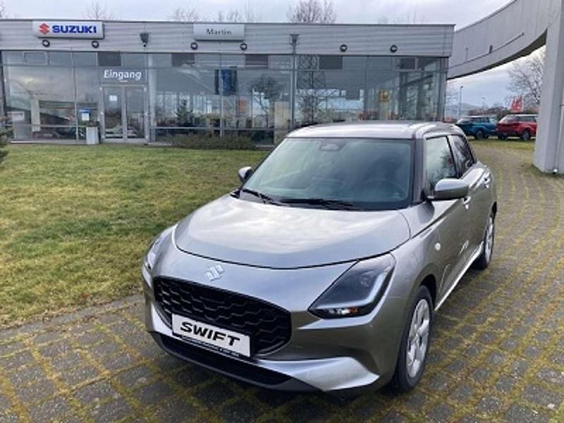 Premium silver met. Neu 2025 Suzuki Swift Comfort Kleinwagen | 19.990 € - Bild 1/4