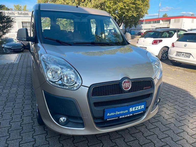 Grau Gebraucht 2012 Fiat Doblò Pop Van / Kleinbus | 7.650 € (Teuer) - Bild 1/4