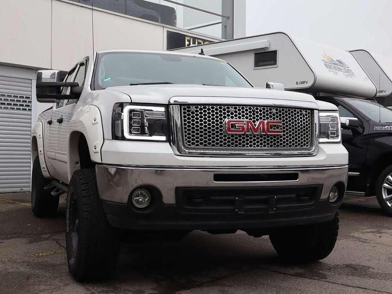 Weiss Gebraucht 2012 GMC Sierra SUV | 29.890 € - Bild 1/4
