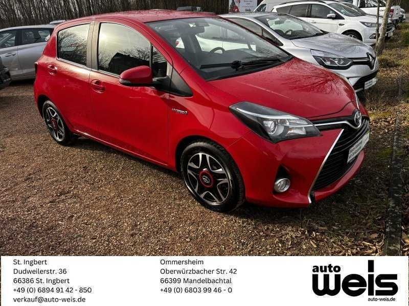 Rot Gebraucht 2014 Toyota Yaris Hybrid Comfort Limousine | 12.490 € (Etwas zu teuer) - Bild 1/4