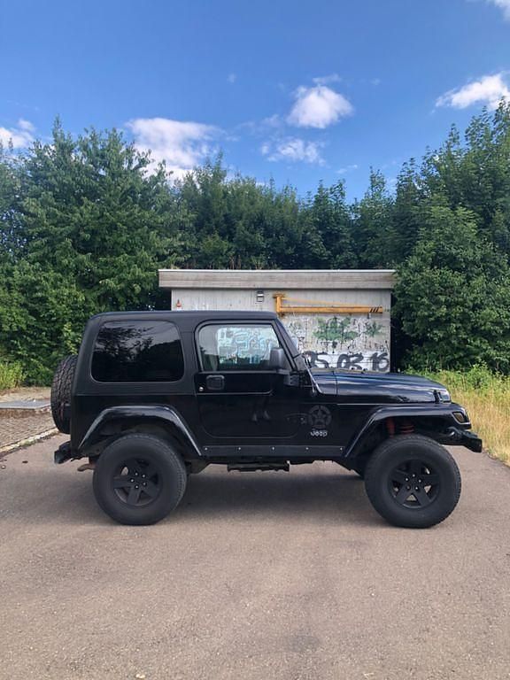 Schwarz Gebraucht 2004 Jeep Wrangler Rubicon SUV | 24.950 € (Teuer) - Bild 1/4