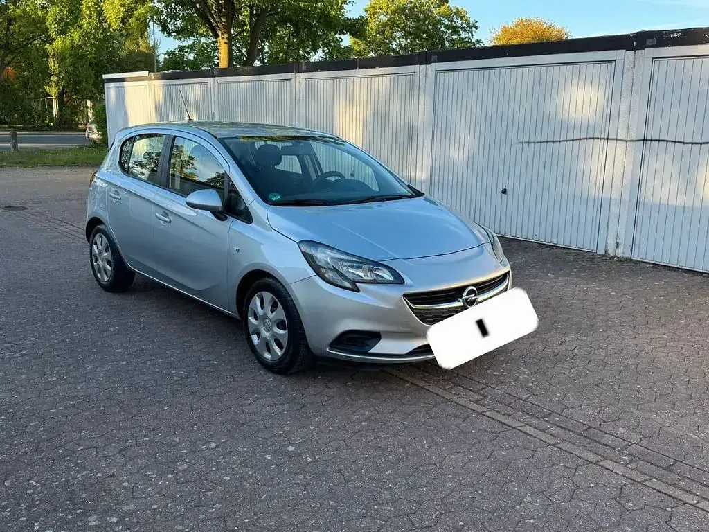Second-hand Opel Corsa Active 90 CP (66 kW) 2015 Argintiu Hatchback