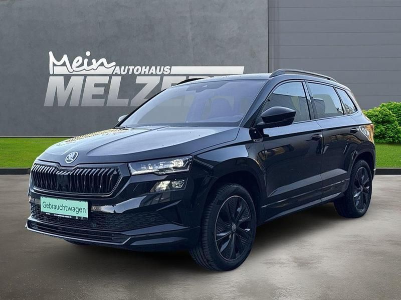 Schwarz Gebraucht 2024 Skoda Karoq SportLine SUV | 35.880 € (Fairer Preis) - Bild 1/4