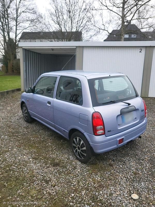Gebraucht Daihatsu Cuore 56 PS (41 kW) 2003 Violet Kleinwagen