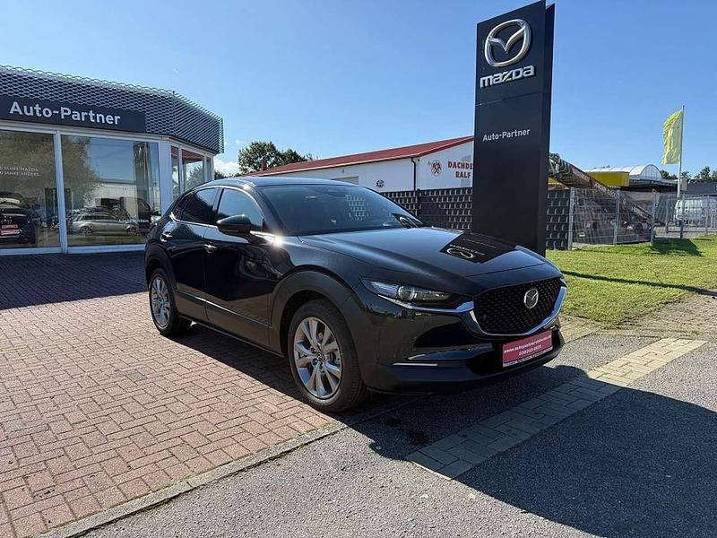 Jet black Neu 2025 Mazda CX-30 Exclusive-Line SUV | 33.990 € - Bild 1/4