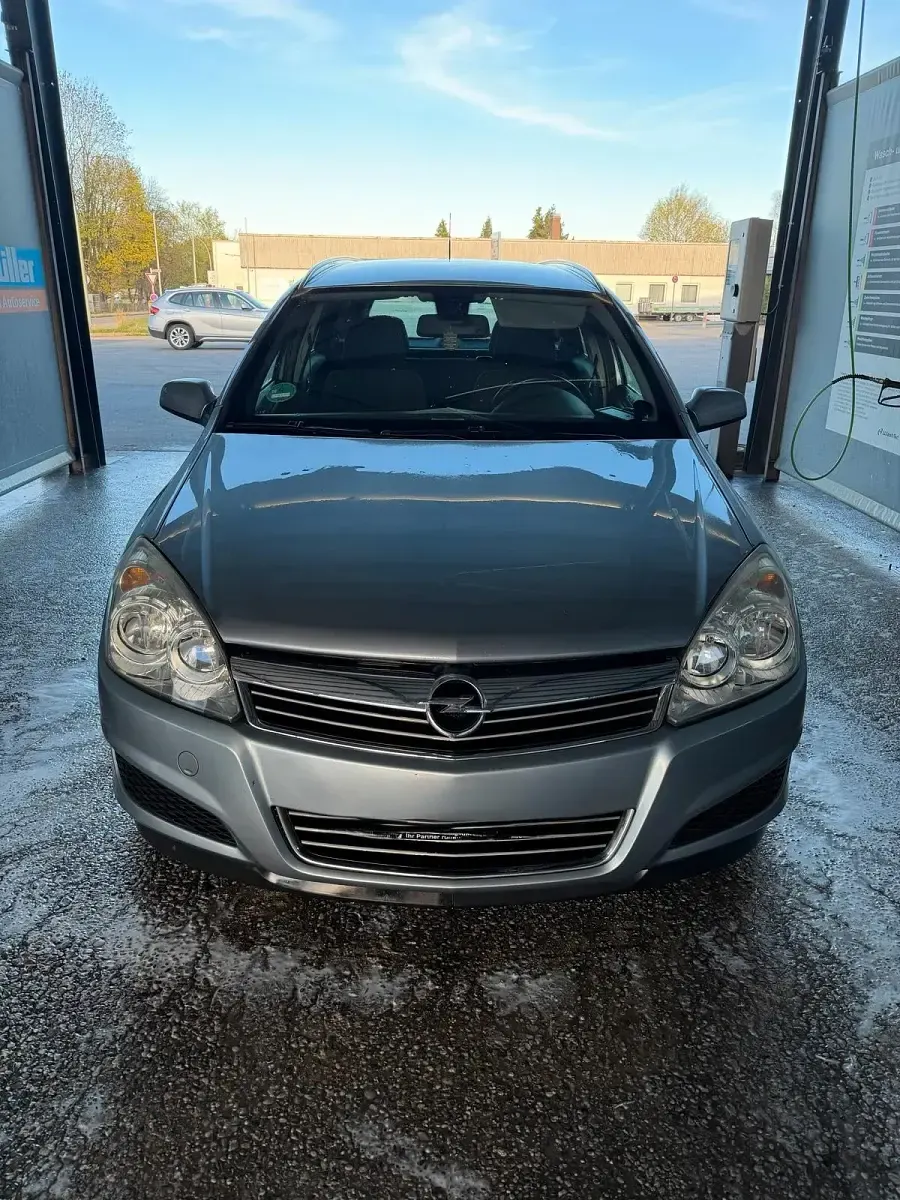Używany Opel Astra 125 KM (91 kW) 2009 Srebrny Kombi