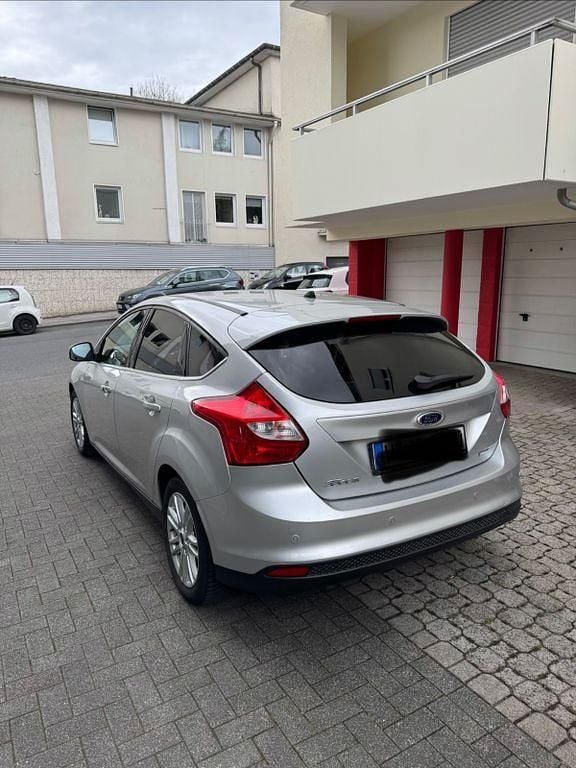 Second-hand Ford Focus 125 CP (91 kW) 2013 Argintiu Berlinǎ