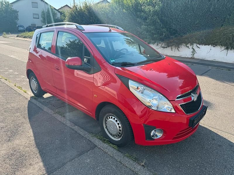 Rot Gebraucht 2010 Chevrolet Spark Kleinwagen | 2.199 € - Bild 1/4