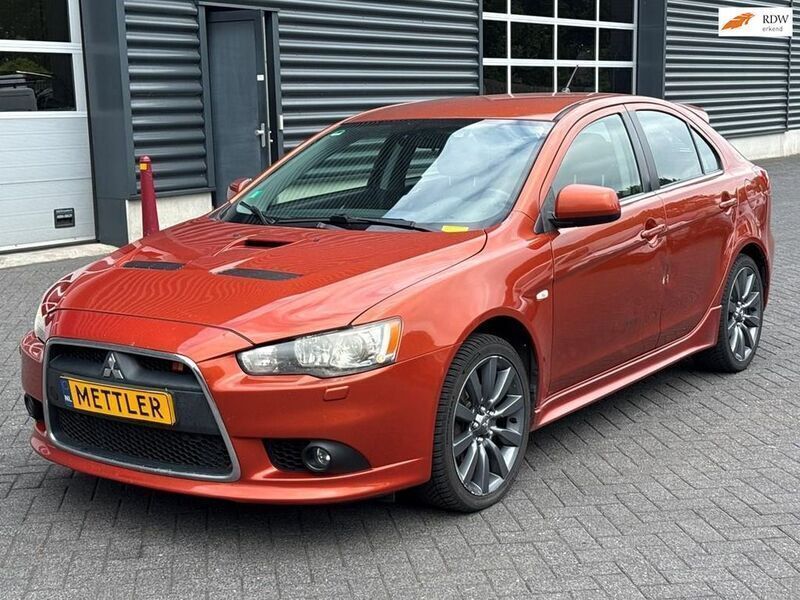 Orange Gebraucht 2010 Mitsubishi Lancer Limousine | 8.950 € (Fairer Preis) - Bild 1/4