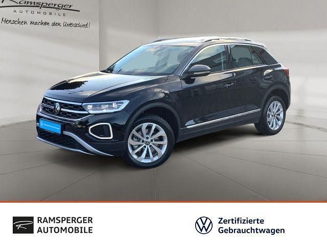 Deep black perleffekt/indiumgr Gebraucht 2024 VW T-Roc Style SUV | 31.990 € (Fairer Preis) - Bild 1/4