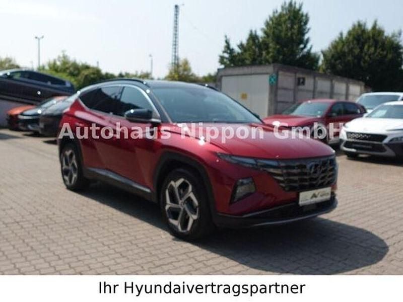 Sunset red Gebraucht 2021 Hyundai Tucson Prime SUV | 29.950 € (Fairer Preis) - Bild 1/2