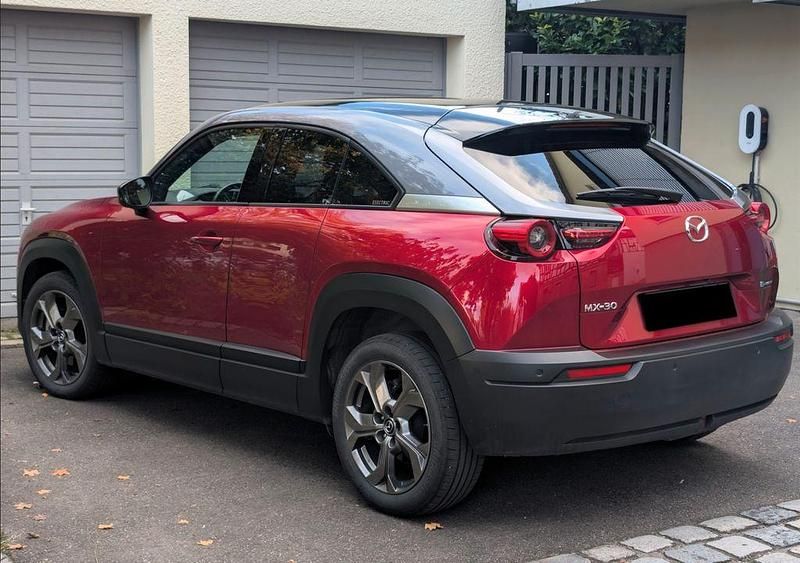 Rot Gebraucht 2022 Mazda MX30 Prime-Line SUV | 21.900 € - Bild 1/4