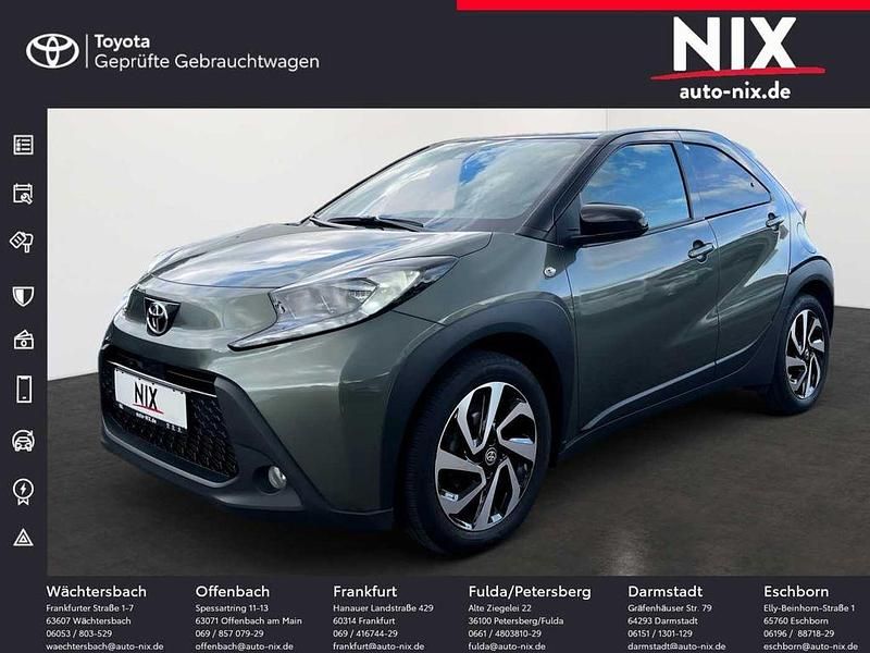 Grün Gebraucht 2023 Toyota Aygo Pulse Kleinwagen | 14.970 € (Fairer Preis) - Bild 1/4
