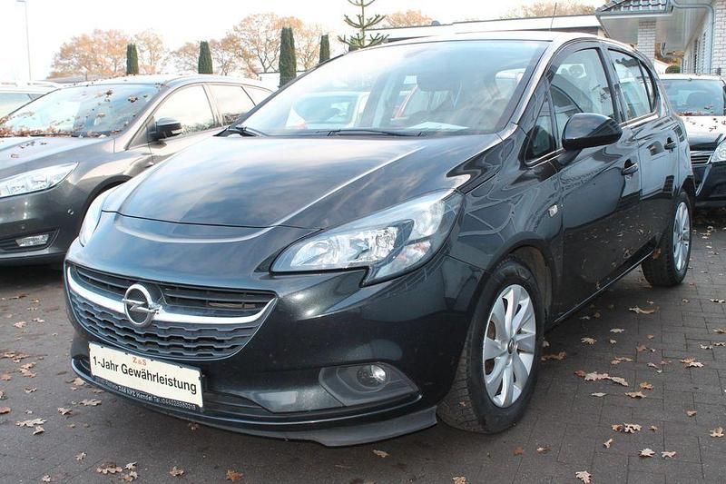 Używany Opel Corsa Edition 95 KM (69 kW) 2016 Czarny Sedan/Limuzyna