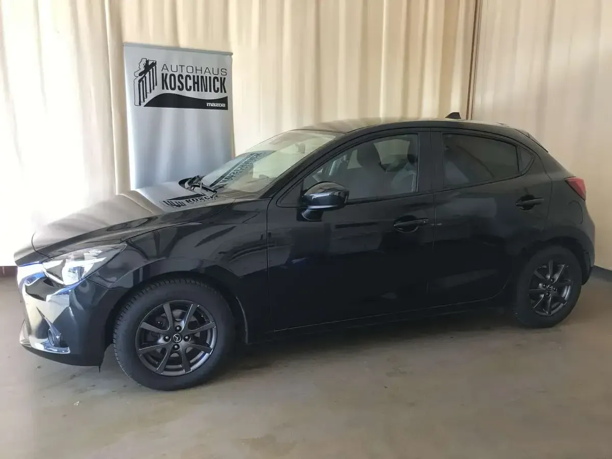 Gebraucht Mazda 2 Exclusive 90 PS (66 kW) 2015 Onyxschwarz metallic Kleinwagen