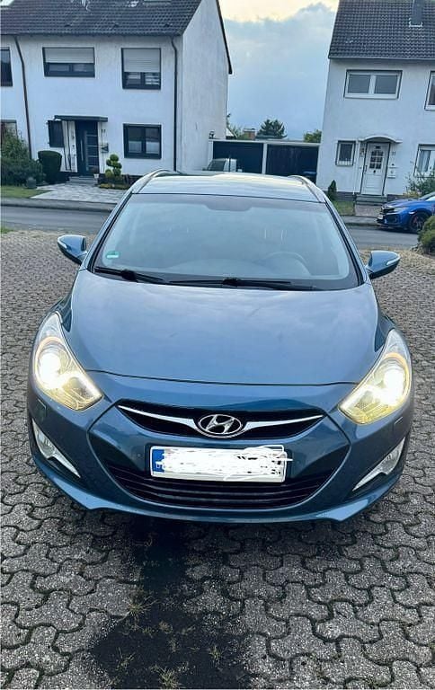 Blau Gebraucht 2013 Hyundai i40 Edition Kombi | 6.599 € (Guter Preis) - Bild 1/4